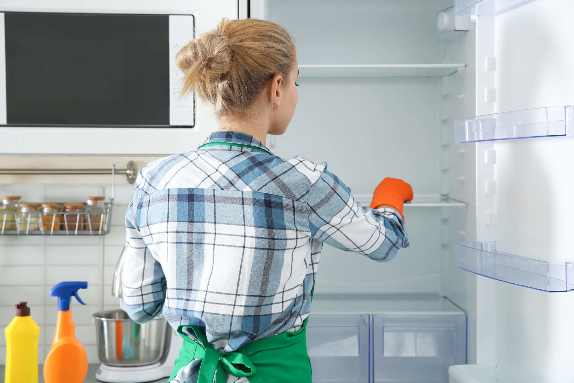 Woman-Gloves-Cleaning-Refrigerator.jpg